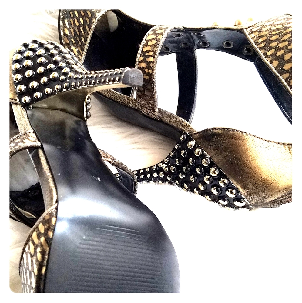 Gold and black guess heels